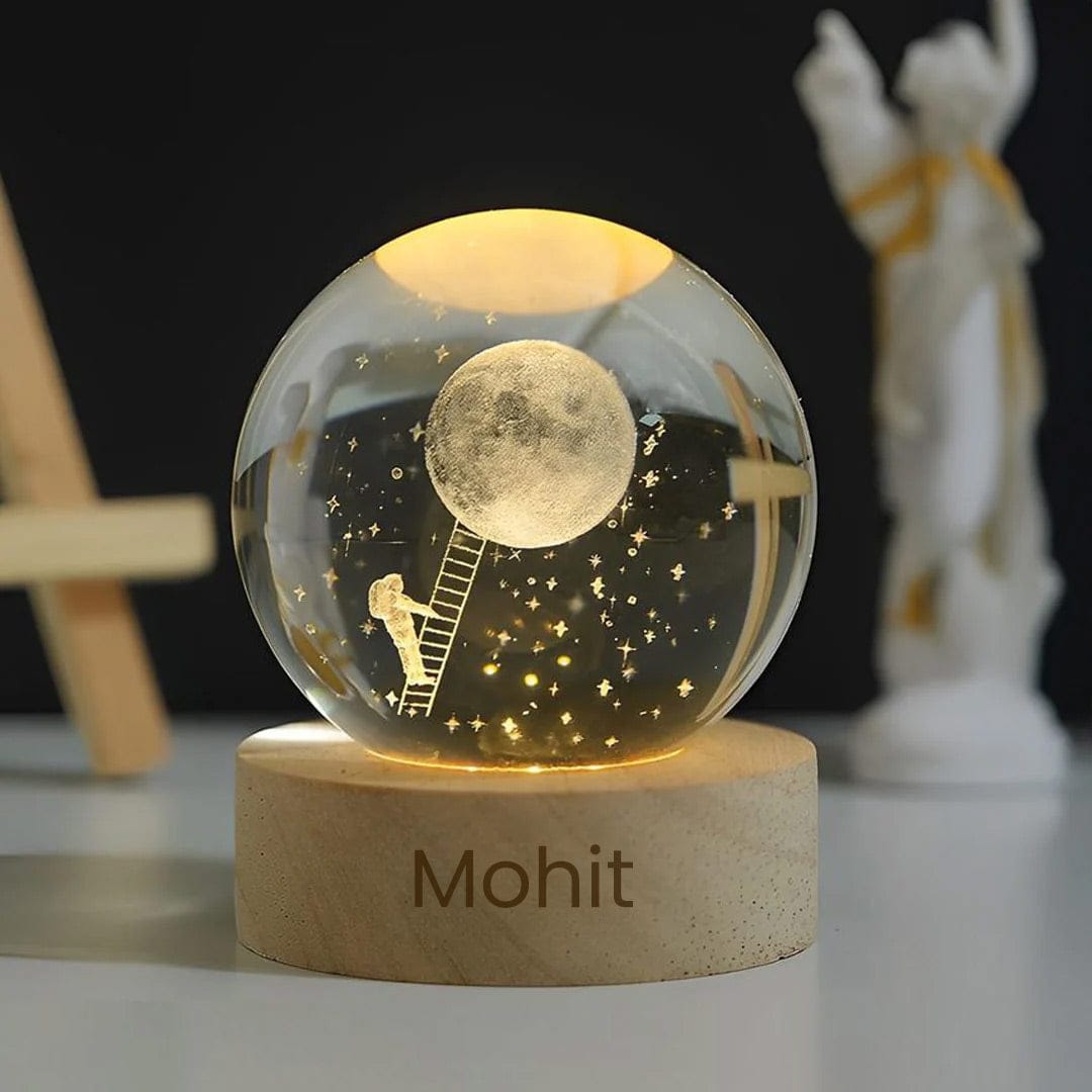 Romantic night scene with personalized moon globe lamp lit in golden glow – dreamy and cozy setup