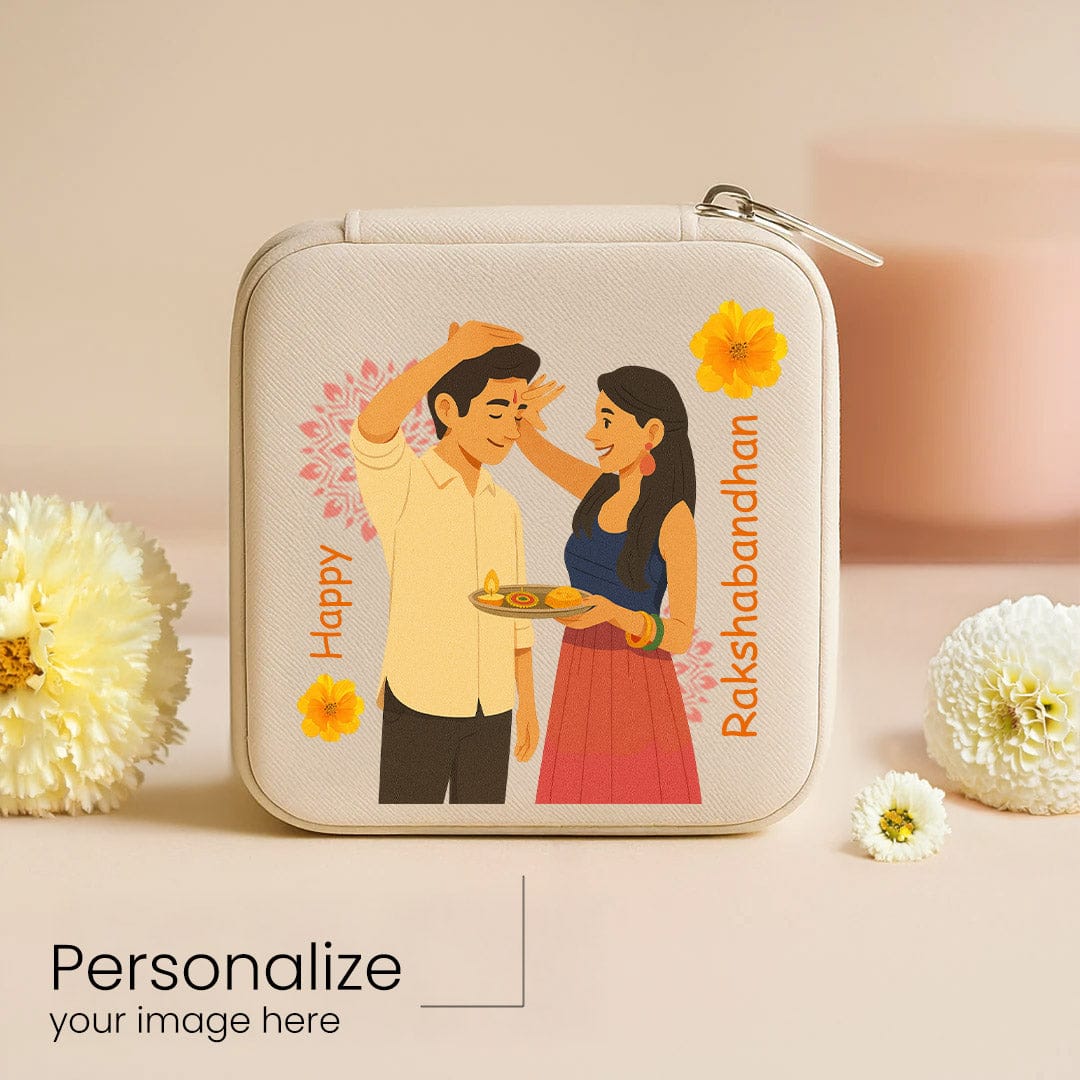 Rakshabandhan-themed travel jewellery case with customizable image on top, surrounded by white flowers and festive setup.